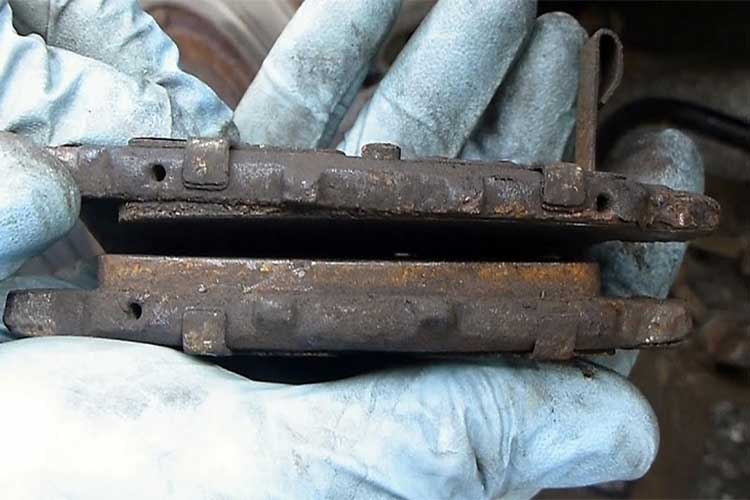 Sticking Brake Caliper Symptoms That Cause Uneven Pad Wear